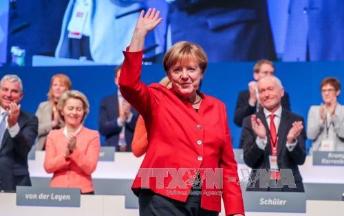 Канцлер Германии переизбрана в должность председателя партии ХДС - ảnh 1